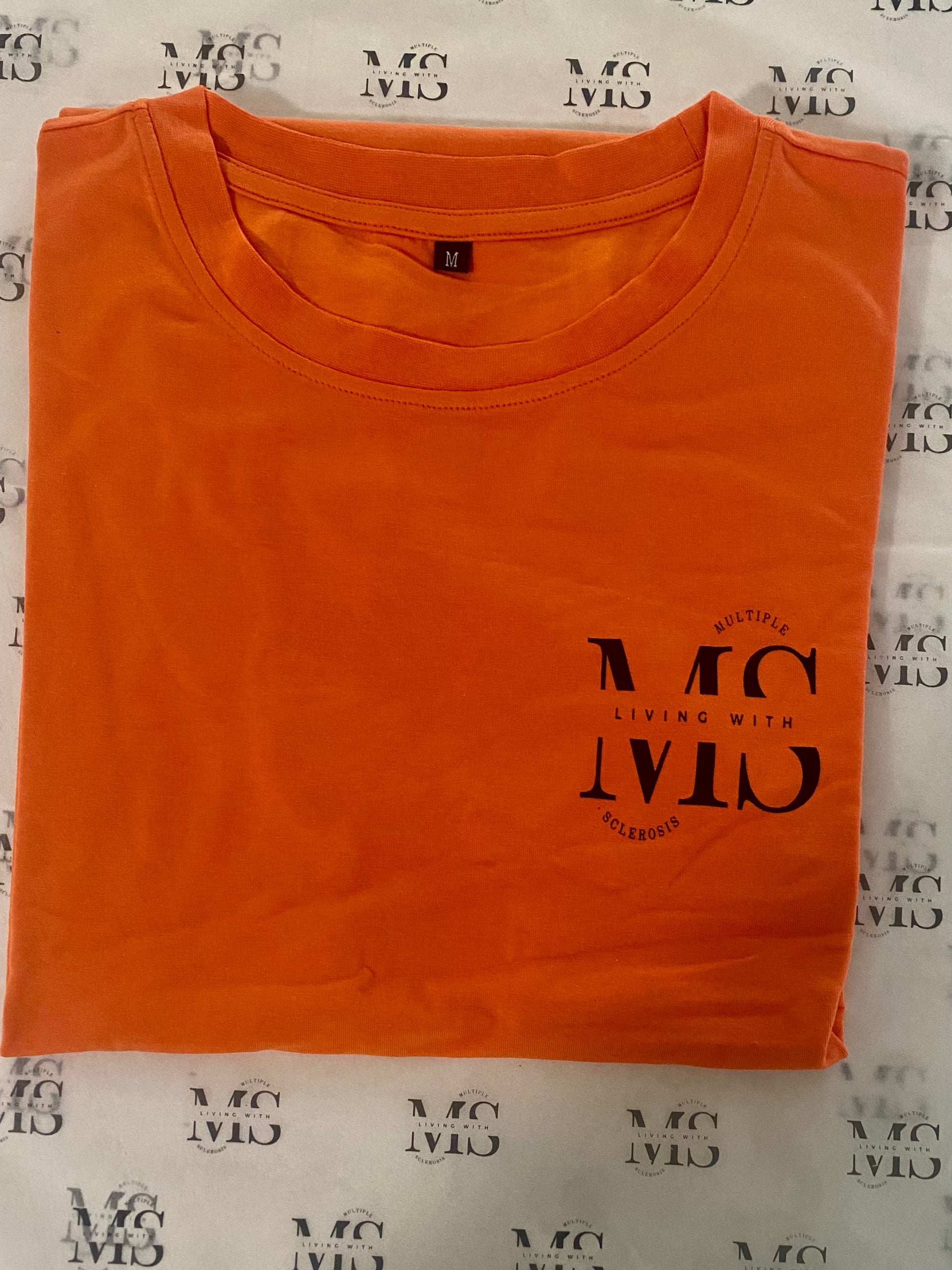 Orange T-shirt with Black living with logo